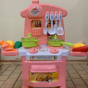 Pink children's kitchen activity toy set