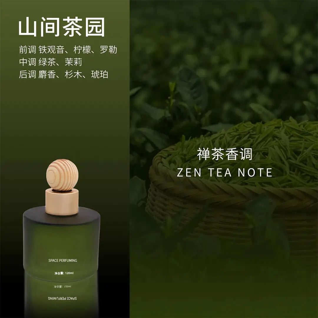 A dark green glass car perfume bottle with a light wood cap is shown against a split background: a dark green panel on the left with Chinese text and English 'ZEN TEA NOTE,' and a tea-field scene on the right with Chinese text. The product appears to be a fragrance advertisement rather than a plain product cutout, but it is still centered on the product itself rather than instructions or a chart.