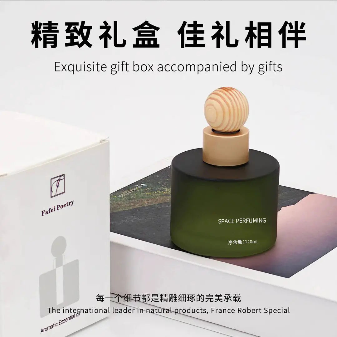 A dark green cylindrical perfume bottle with a light wood-grain cap sits on top of an open white gift box. The box lid is partly visible on the left, showing the brand name 'Fafei Poetry'.